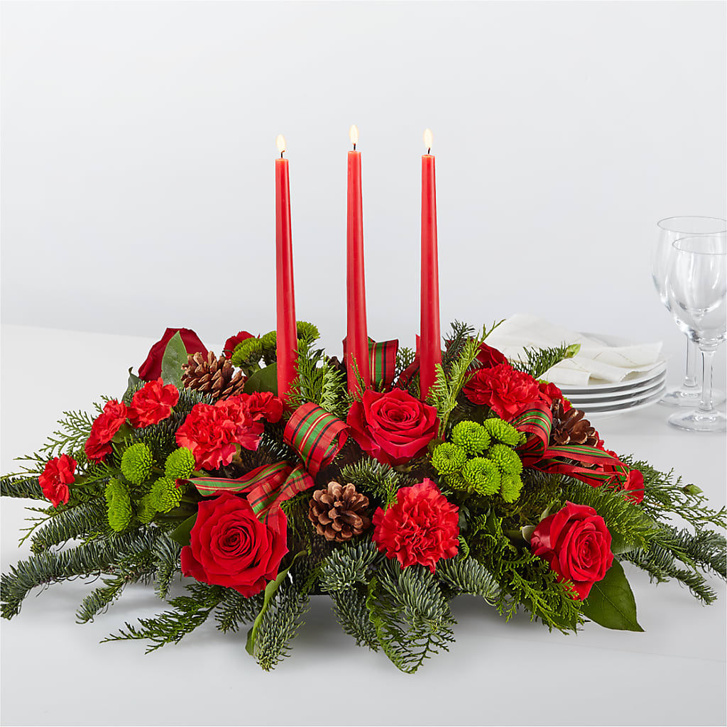 A la luz del centro de mesa con velas